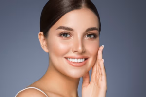 Radiant woman touching face, showcasing Botox benefits for smooth skin.