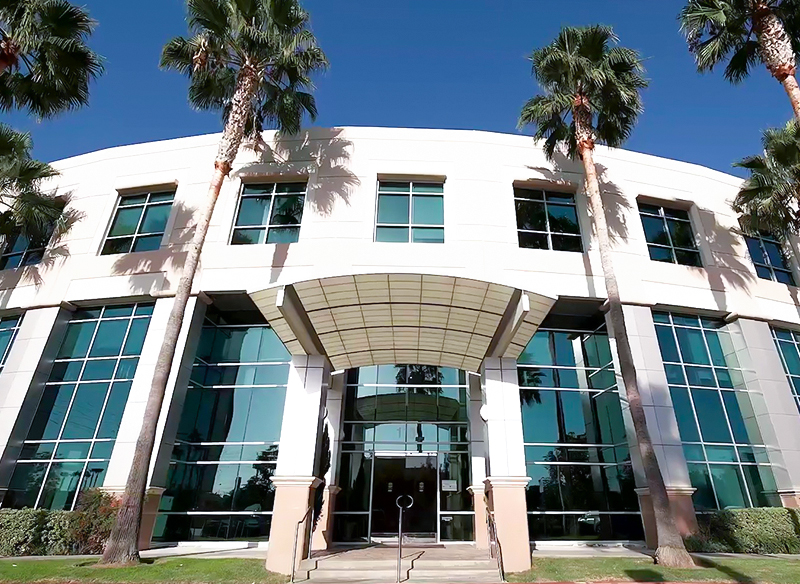 Modern medical office building in Irvine on Waterworks Way, location of facial plastic surgery clinic in Orange County.